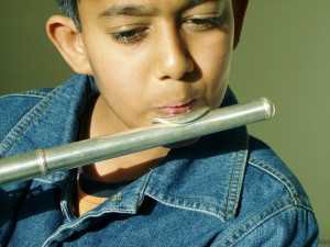 boy playing flute