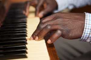hands improvising on piano