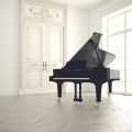 grand piano in white room isolated