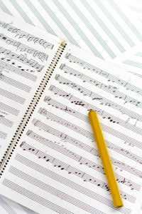 manuscript paper and pencil