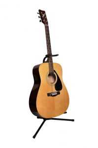 acoustic guitar on stand