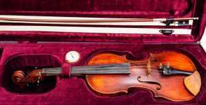 violin case with hygrometer