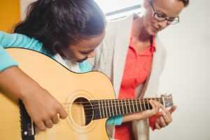 summer music lessons on guitar