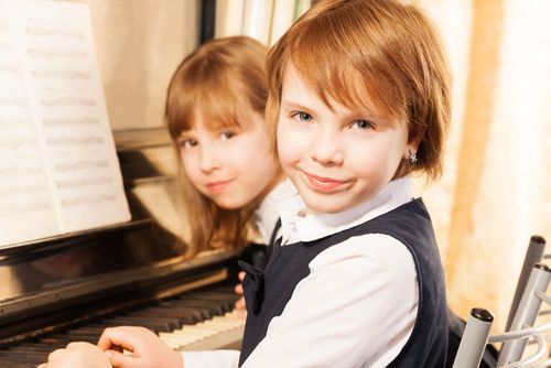 siblings piano lessons